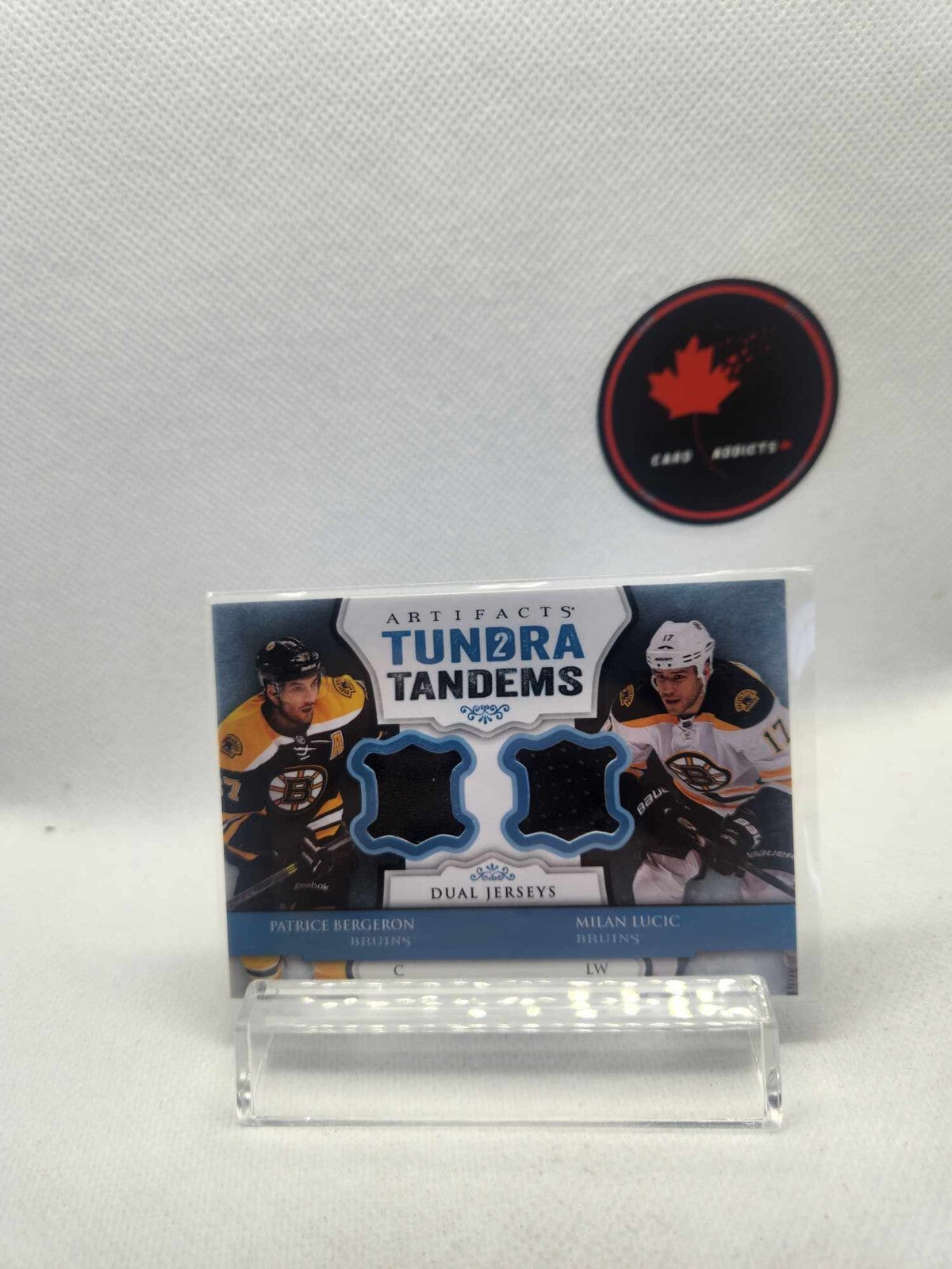 BERGERON/LUCIC TL-BB...2013-14 ARTIFACTS TUNDRA TANDEMS ..DUAL JERSEYS
