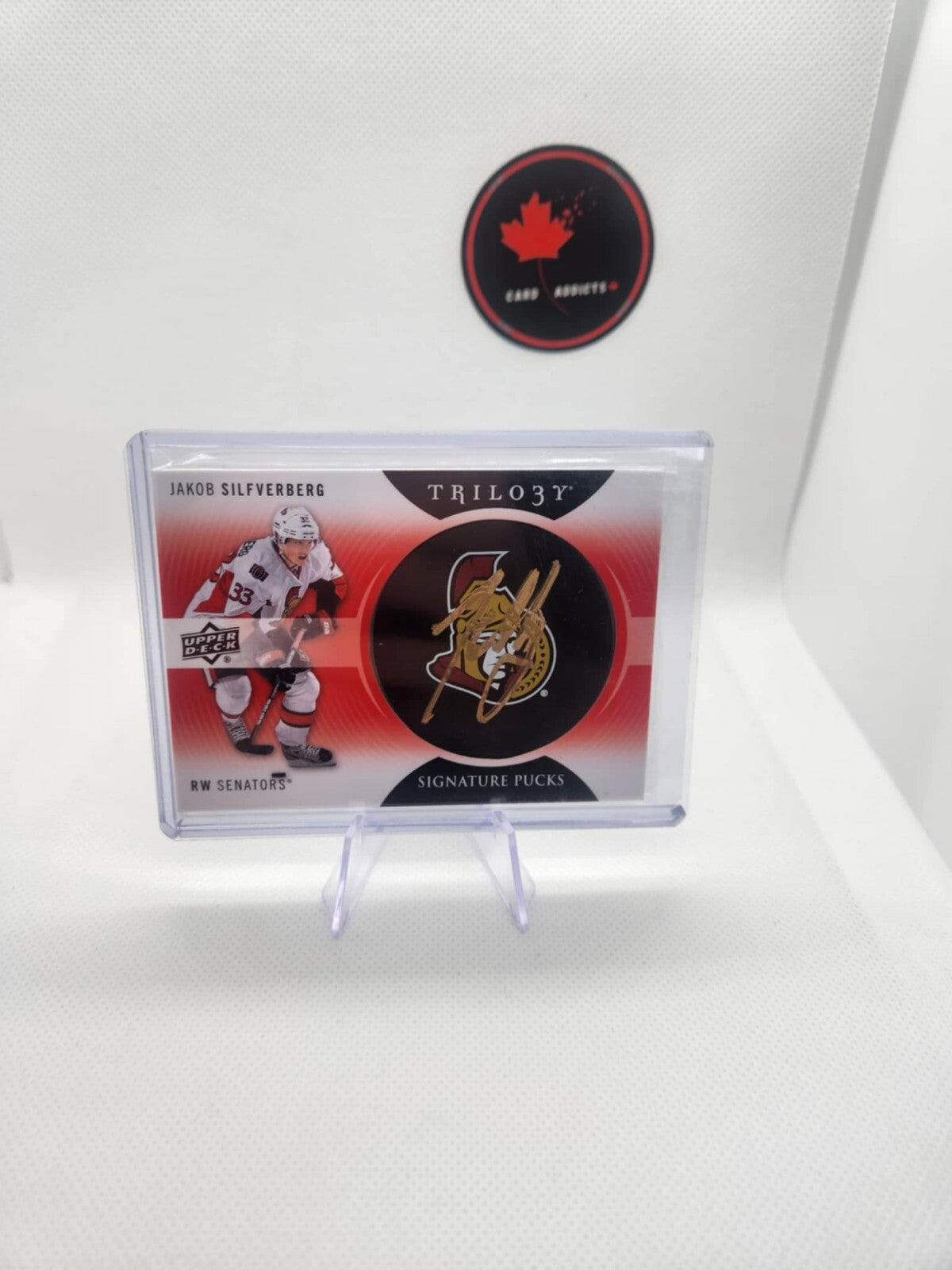 2013-14 Upper Deck Trilogy Signature Pucks Retro Logo Jakob Silfverberg AUTO