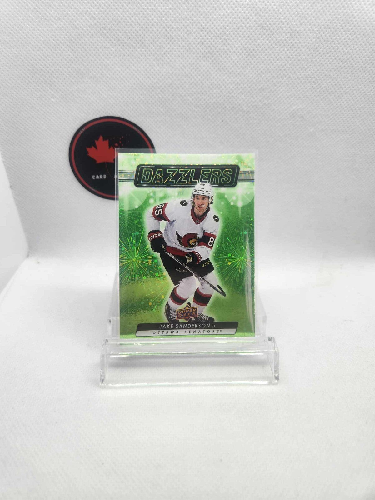 2022-23 Upper Deck Series 2 Green Dazzlers Jake Sanderson