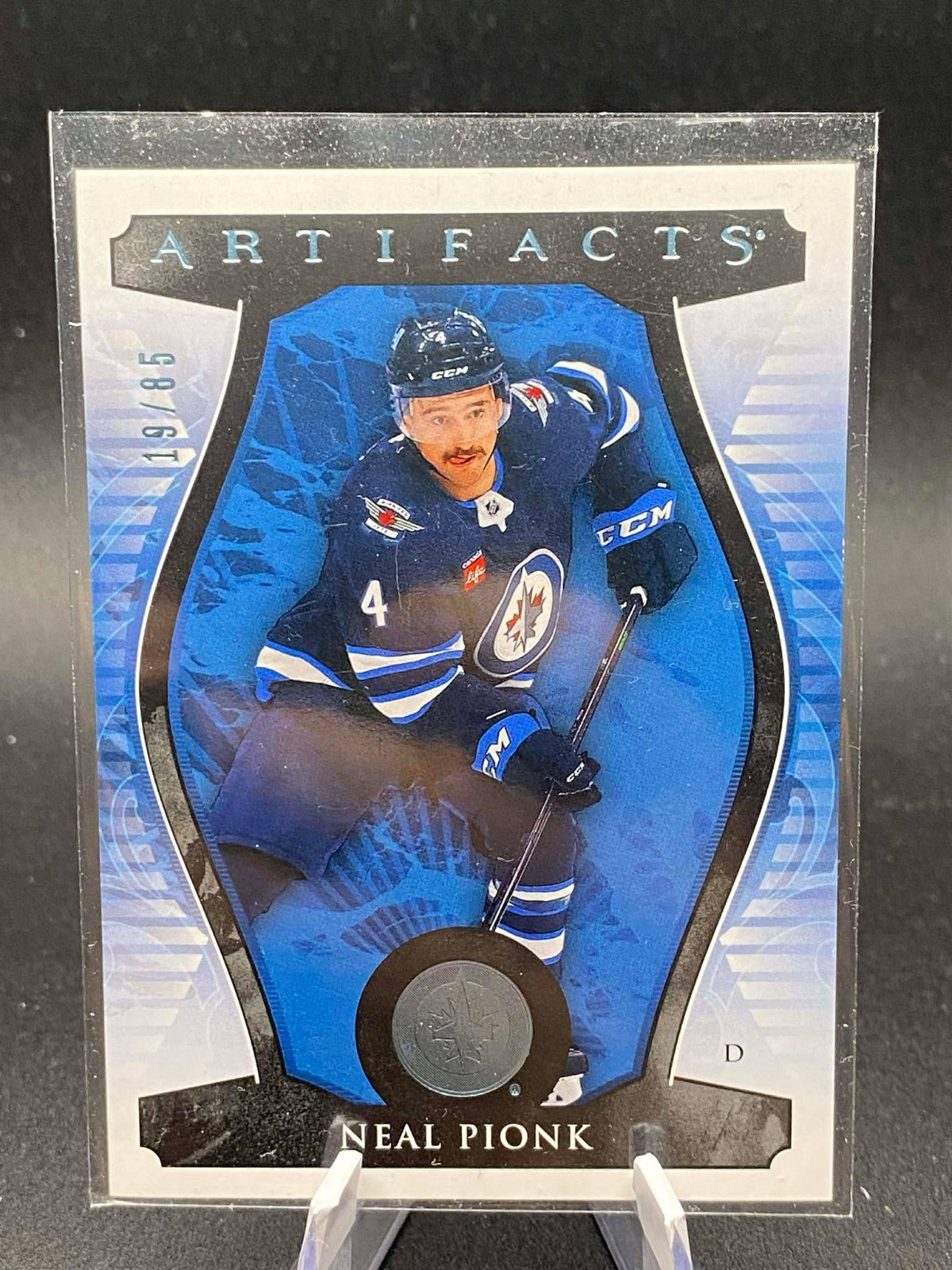 2023-24 Upper Deck Artifacts Light Blue Steel #/85 Neal Pionk #37 Winnipeg Jets
