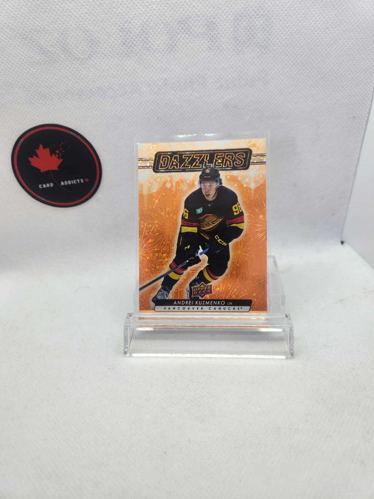 2023-24 Upper Deck Series 1 Dazzlers Orange Andrei Kuzmenko Vancouver Canucks
