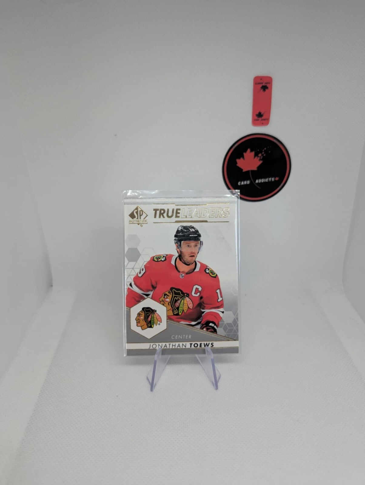 2022-23 SP AUTHENTIC HOCKEY TRUE LEADERS #TL-22 JONATHAN TOEWS
