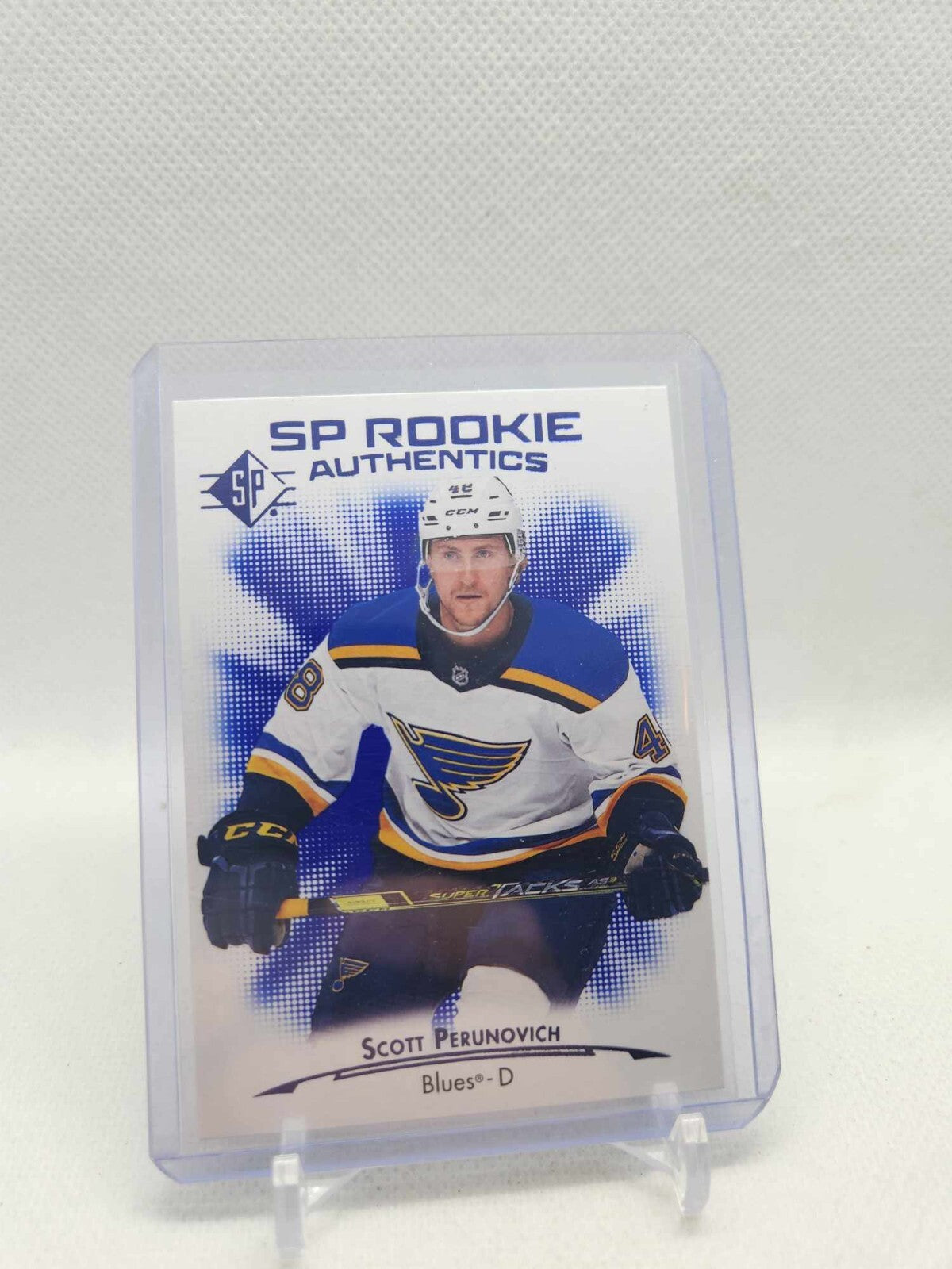 2021-22 UD SP Hockey Rookie Authentics Blue #115 Scott Perunovich