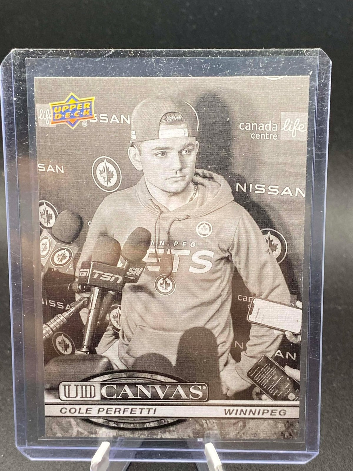 2025-26 Upper Deck Series 1 UD Canvas Black White C-20 Cole Perfetti Winnipeg