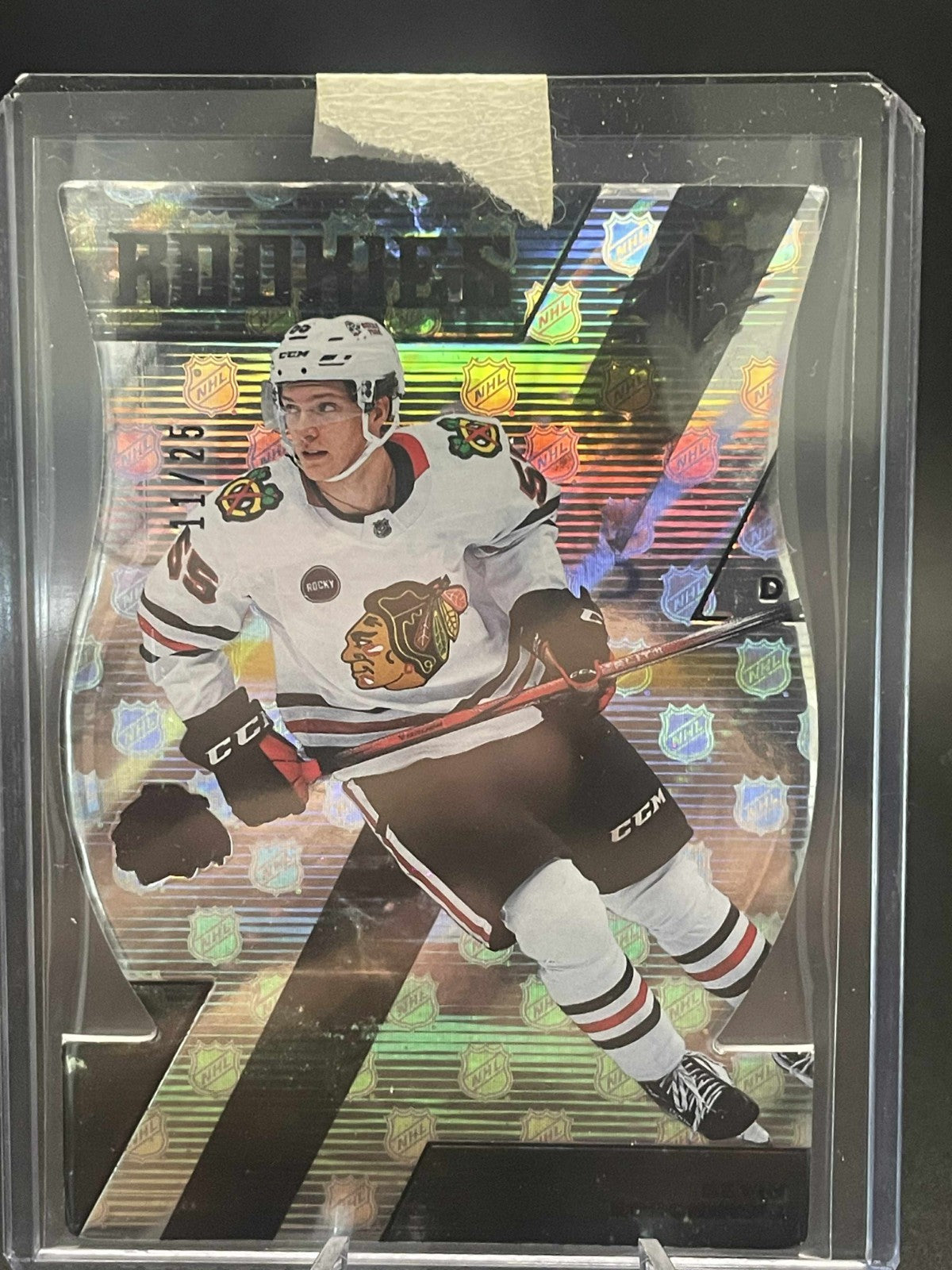 2023-24 SPx NHL Shield Die-Cut Hologram Rookie Kevin Korchinski /25