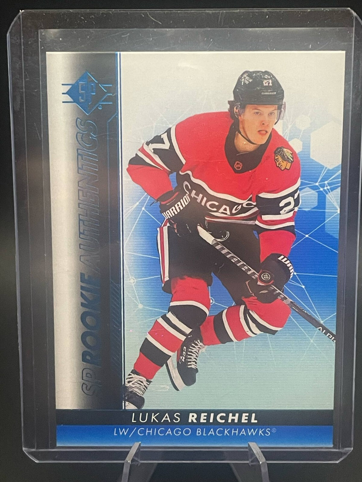 2022-23 UD SP AUTHENTIC ROOKIE BLUE #106 LUKAS REICHEL CHICAGO BLACKHAWKS