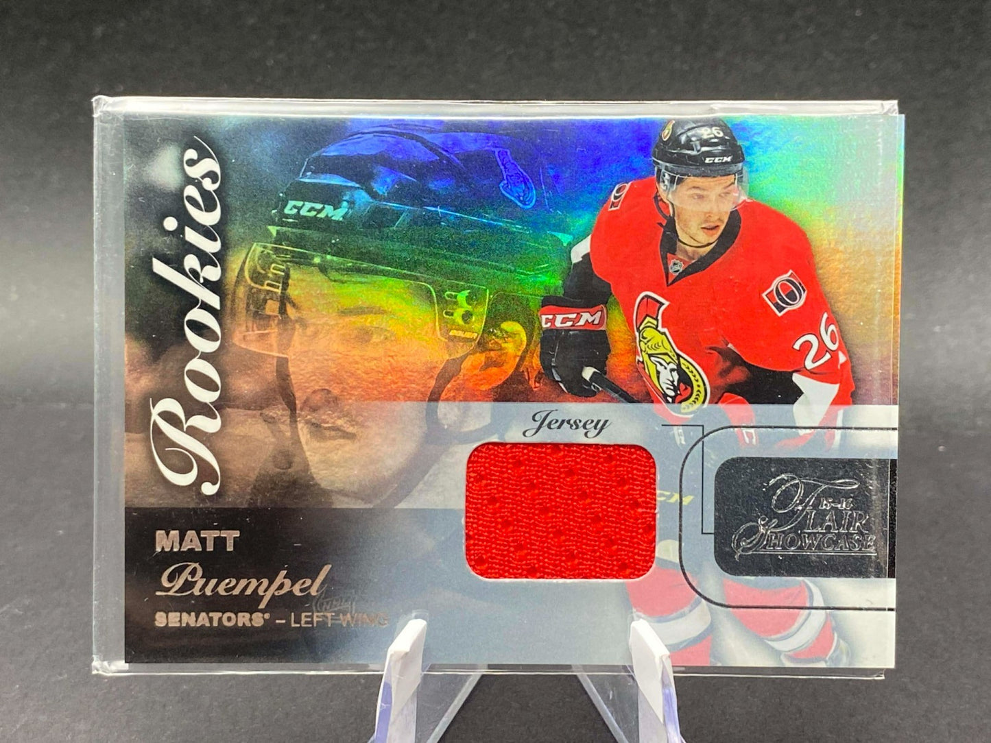 2015-16 Fleer Showcase Matt Puempel Row 0 Seat 63 Rookies Flair Jersey RC