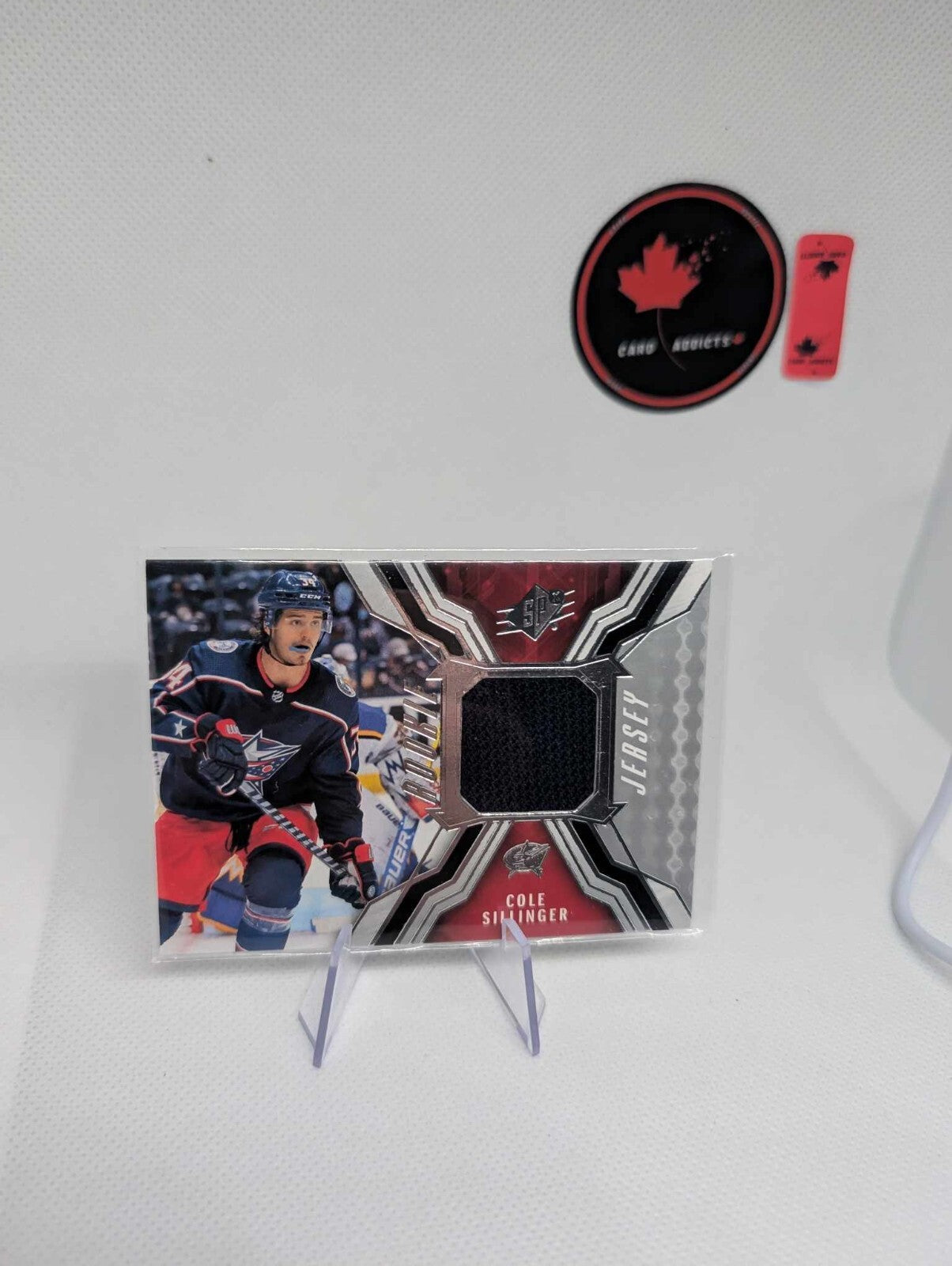 21-22 Upper Deck SPx Rookie Jersey COLE SILLINGER #RJ-CS Blue Jackets UD RC